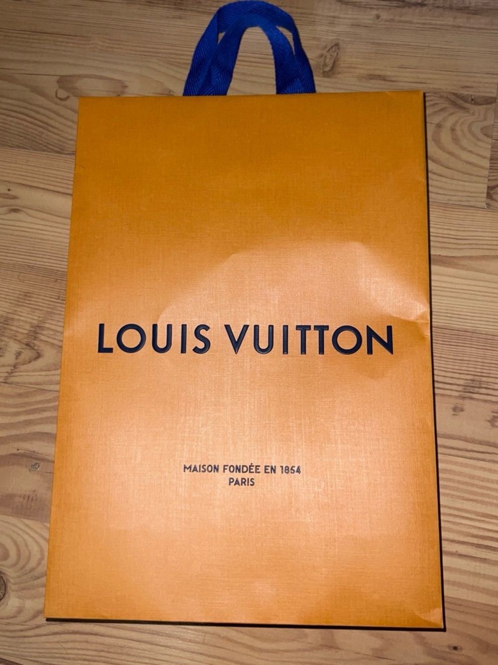 Authentic Louis Vuitton Orange Shopping Bag with Blue Handles